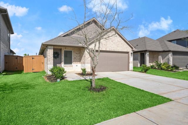 20010 Sienna Green Dr, Hockley, TX 77447 - view of front of property featuring a gate, brick siding, a garage, concrete driveway, and roof with shingles