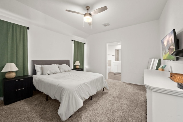 20010 Sienna Green Dr, Hockley, TX 77447 - bedroom featuring carpet flooring, ensuite bathroom, ceiling fan, and baseboards
