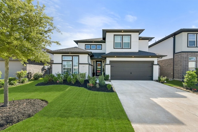 5107 Shimmering Brook Ln, Fulshear, TX 77441 - prairie-style house with driveway, a front lawn, stucco siding, a garage, and brick siding