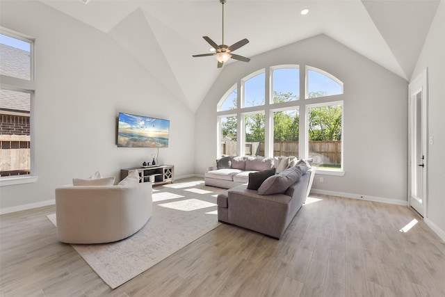 5107 Shimmering Brook Ln, Fulshear, TX 77441 - living area featuring a ceiling fan, light wood-style flooring, vaulted ceiling, and baseboards