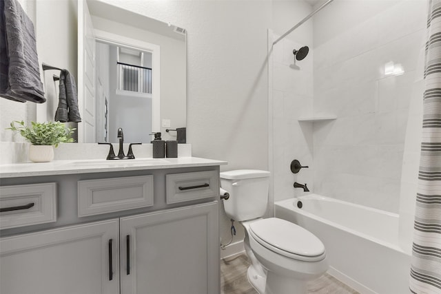 5107 Shimmering Brook Ln, Fulshear, TX 77441 - bathroom with vanity, toilet, shower / tub combo with curtain, and wood finished floors