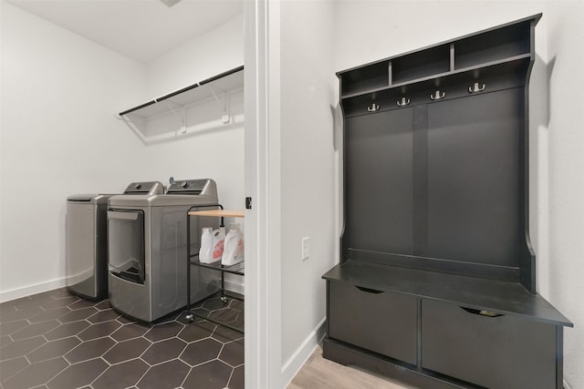 5107 Shimmering Brook Ln, Fulshear, TX 77441 - washroom with washing machine and dryer and baseboards