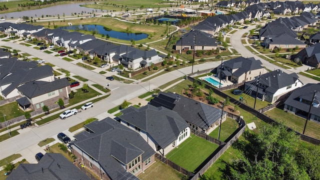 5107 Shimmering Brook Ln, Fulshear, TX 77441 - aerial view of property and surrounding area with nearby suburban area and a nearby body of water