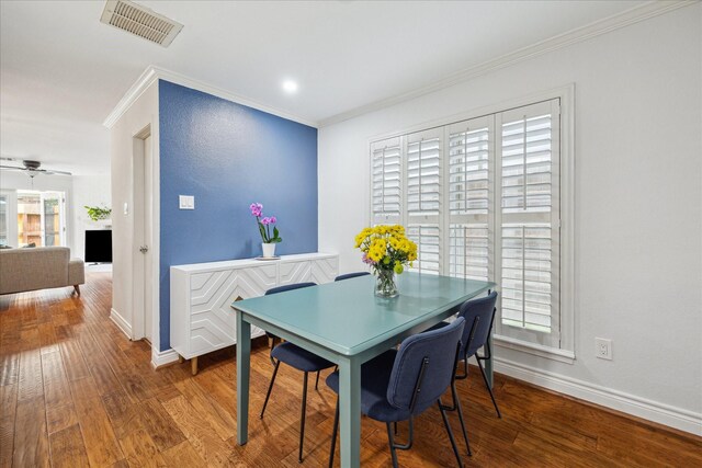2513 Bering Dr Unit 13, Houston, TX 77057 - dining room featuring ornamental molding, wood finished floors, baseboards, and ceiling fan