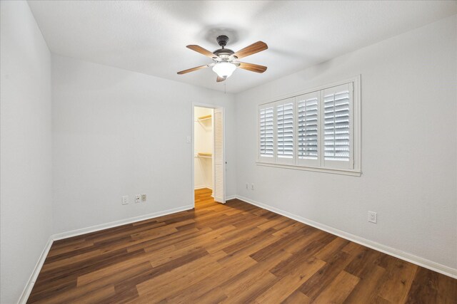 2513 Bering Dr Unit 13, Houston, TX 77057 - unfurnished bedroom with baseboards, wood finished floors, and a closet