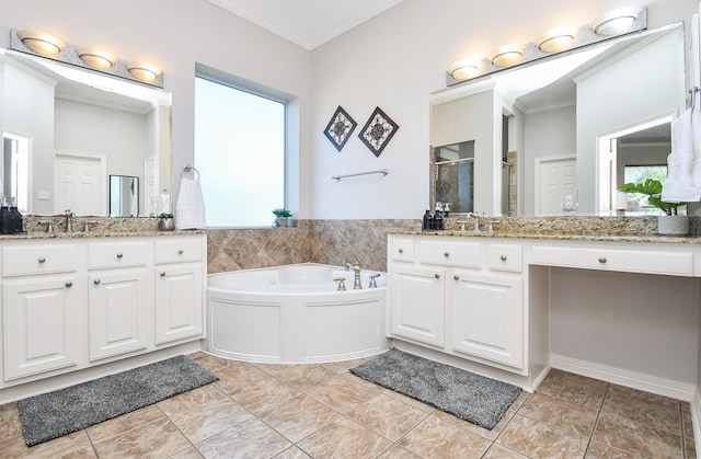 31 Hope Farm Rd, Missouri City, TX 77459 - full bathroom featuring crown molding, a stall shower, a garden tub, two vanities, and plenty of natural light