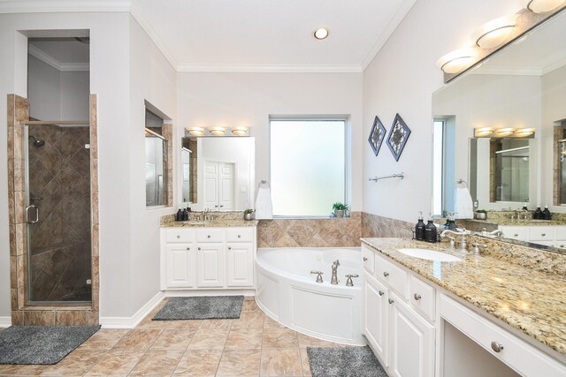 31 Hope Farm Rd, Missouri City, TX 77459 - full bathroom with a shower stall, a bath, two vanities, ornamental molding, and recessed lighting