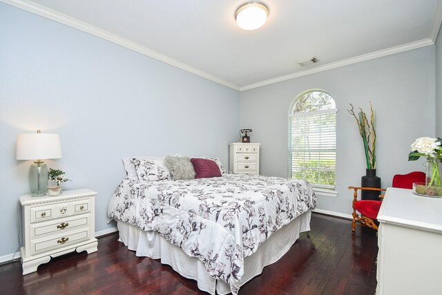31 Hope Farm Rd, Missouri City, TX 77459 - bedroom featuring crown molding, dark wood-style flooring, and baseboards