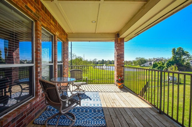 31 Hope Farm Rd, Missouri City, TX 77459 - wooden terrace featuring a lawn