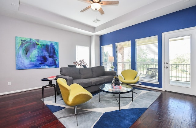 31 Hope Farm Rd, Missouri City, TX 77459 - living area featuring hardwood / wood-style floors, ceiling fan, a raised ceiling, and baseboards