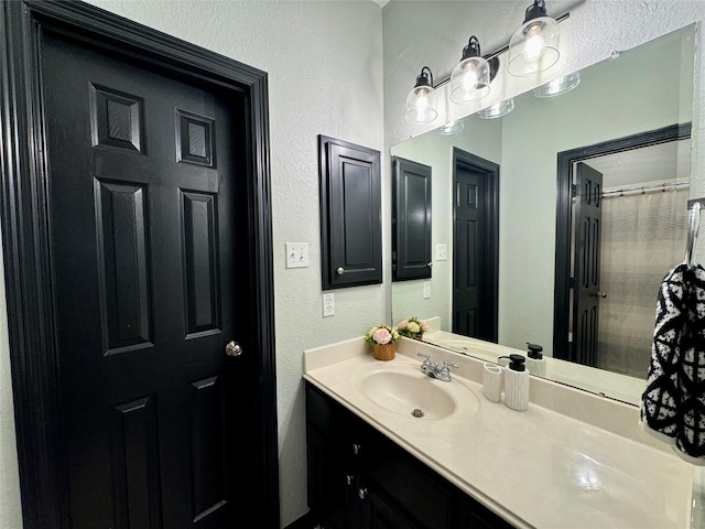 31 Hope Farm Rd, Missouri City, TX 77459 - bathroom with a textured wall and vanity