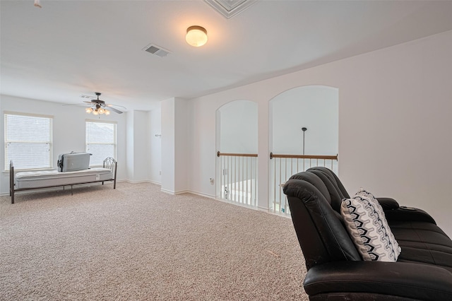 2019 Argos Dr, Missouri City, TX 77459 - living room featuring ceiling fan, carpet floors, and baseboards