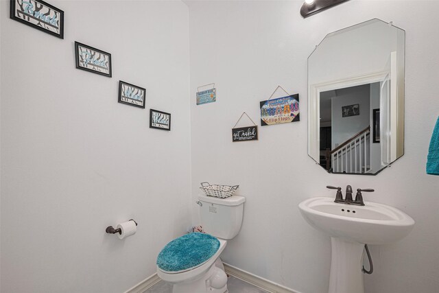 2019 Argos Dr, Missouri City, TX 77459 - half bath featuring toilet and baseboards