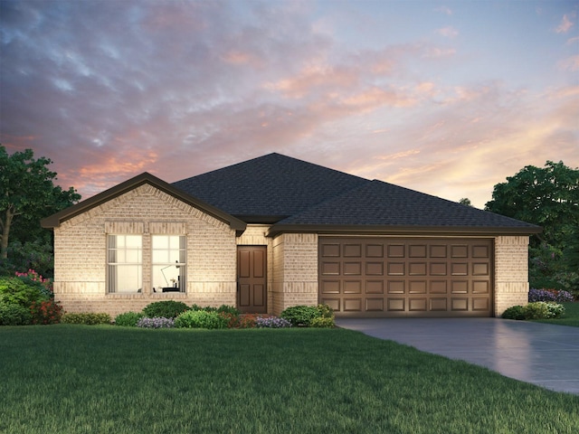 6250 Brazos Trail Dr, Richmond, TX 77469 - french country home with brick siding, concrete driveway, a yard, and an attached garage