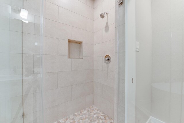 6615 Ezzard Charles Ln, Houston, TX 77091 - bathroom featuring a shower stall