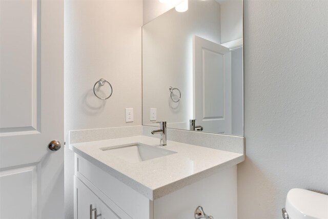 6615 Ezzard Charles Ln, Houston, TX 77091 - bathroom featuring vanity and toilet