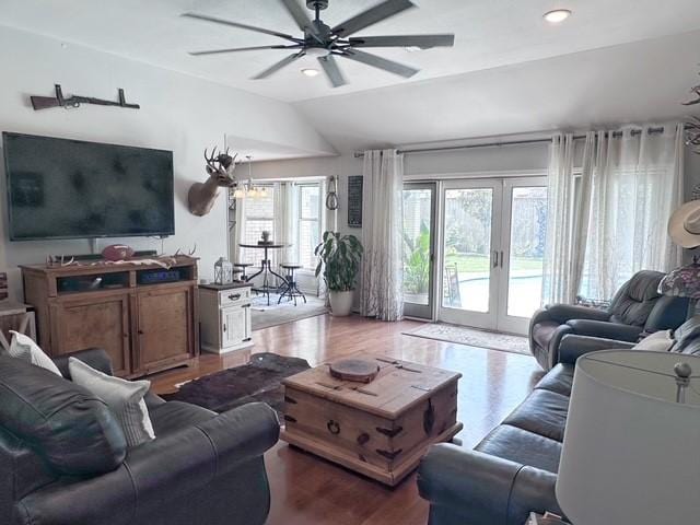 807 Trochta St, El Campo, TX 77437 - living room featuring a ceiling fan, wood finished floors, lofted ceiling, french doors, and recessed lighting