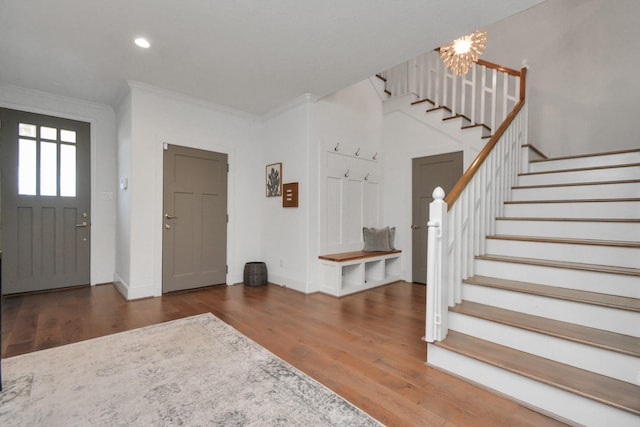 928 Dunbar St, Houston, TX 77009 - entryway featuring stairway, crown molding, wood finished floors, baseboards, and recessed lighting