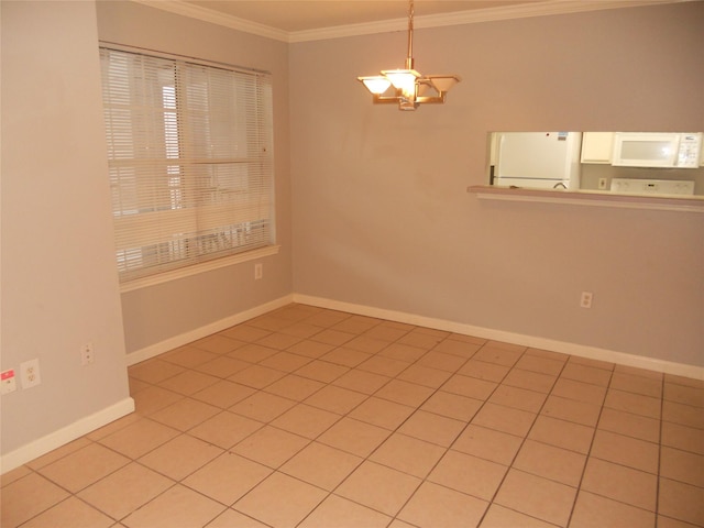 501 W 26th St Unit 208, Austin, TX 78705 - empty room with crown molding, light tile patterned floors, and a chandelier