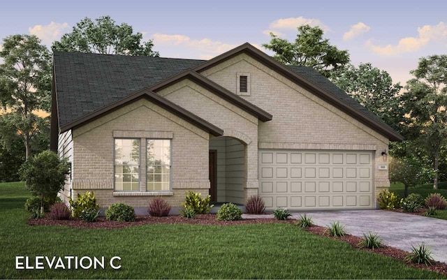 426 Riesling Dr, Alvin, TX 77511 - french country home with asphalt driveway, brick siding, a front lawn, and an attached garage
