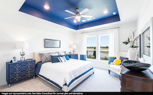 426 Riesling Dr, Alvin, TX 77511 - carpeted bedroom featuring a tray ceiling and baseboards