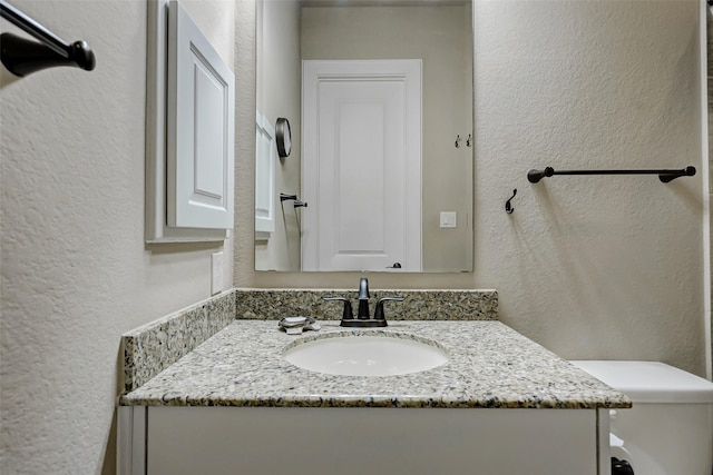 1418 Du Barry Ln, Houston, TX 77018 - bathroom featuring a textured wall and vanity