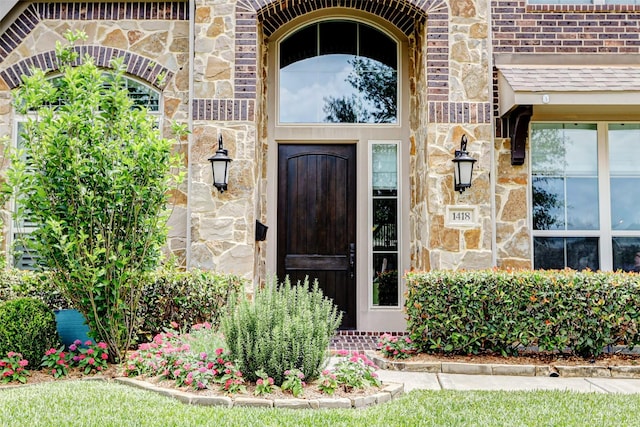 1418 Du Barry Ln, Houston, TX 77018 - view of exterior entry featuring stone siding and brick siding