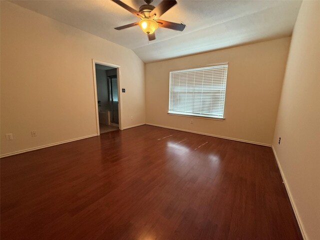 226 W Stedhill Loop, Conroe, TX 77384 - unfurnished room with dark wood-style flooring, vaulted ceiling, a ceiling fan, and baseboards