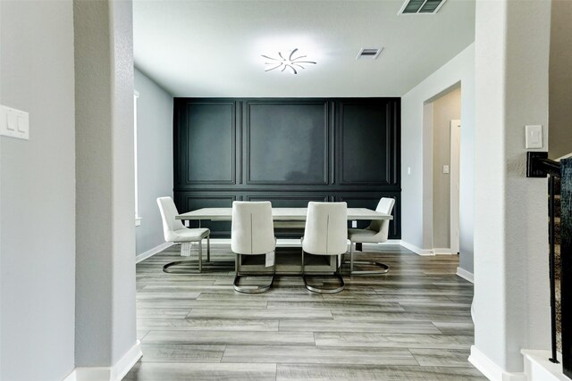4910 Magnolia Springs Dr, Pearland, TX 77584 - dining area featuring baseboards and wood finished floors