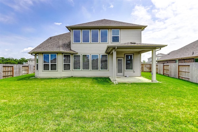 4910 Magnolia Springs Dr, Pearland, TX 77584 - rear view of house with a patio and a shingled roof