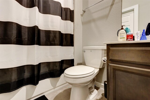4910 Magnolia Springs Dr, Pearland, TX 77584 - full bathroom with toilet, vanity, curtained shower, and a textured wall