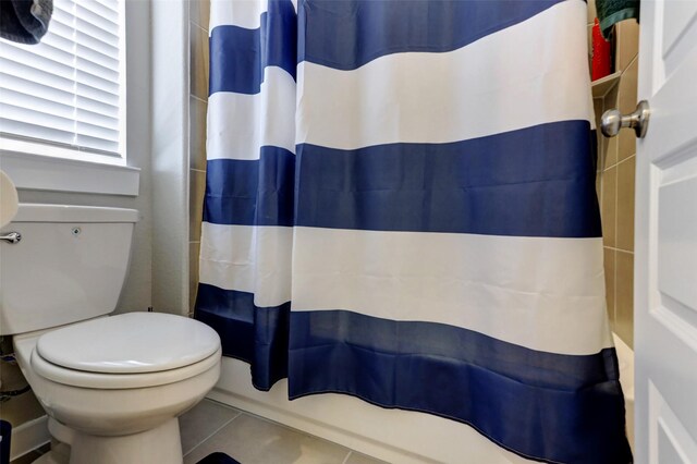 4910 Magnolia Springs Dr, Pearland, TX 77584 - bathroom with tile patterned flooring and toilet