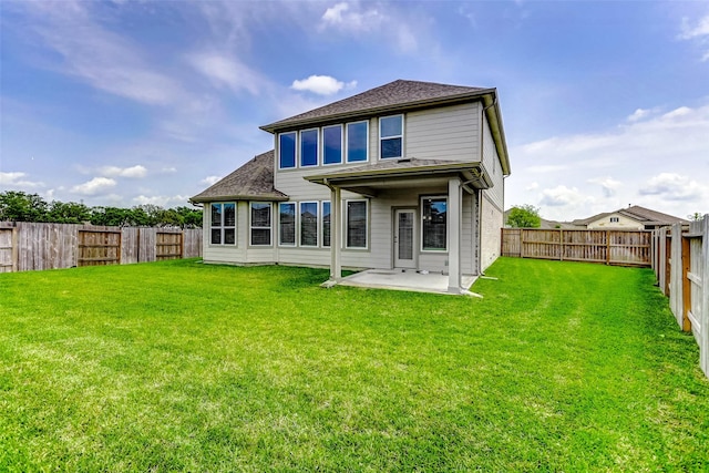 4910 Magnolia Springs Dr, Pearland, TX 77584 - back of house with a patio area and roof with shingles