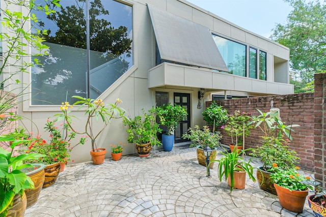 2322 Steel St Unit 19, Houston, TX 77098 - view of front of home with a patio and stucco siding