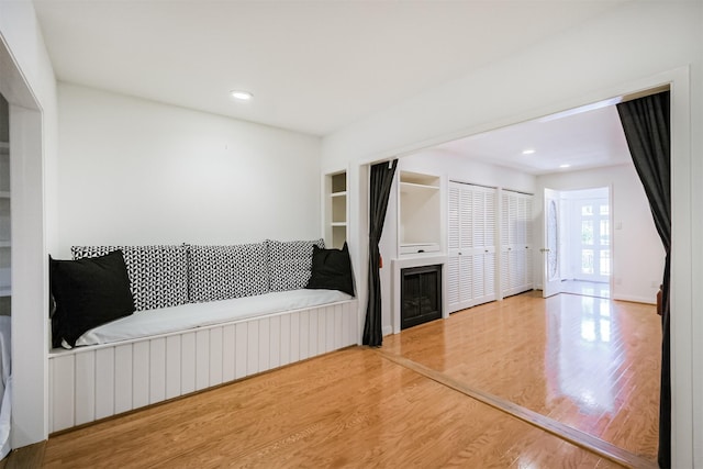 2322 Steel St Unit 19, Houston, TX 77098 - living room featuring wood finished floors and recessed lighting