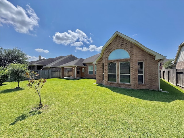 2115 Mooncrest Dr, Houston, TX 77089 - rear view of house with brick siding