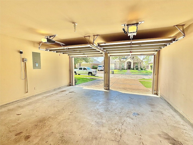 2115 Mooncrest Dr, Houston, TX 77089 - garage with a garage door opener and electric panel