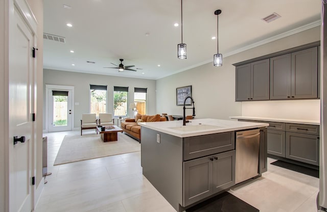 1708 Capron St Unit A, Houston, TX 77020 - kitchen with a sink, gray cabinets, stainless steel dishwasher, a ceiling fan, and a center island with sink