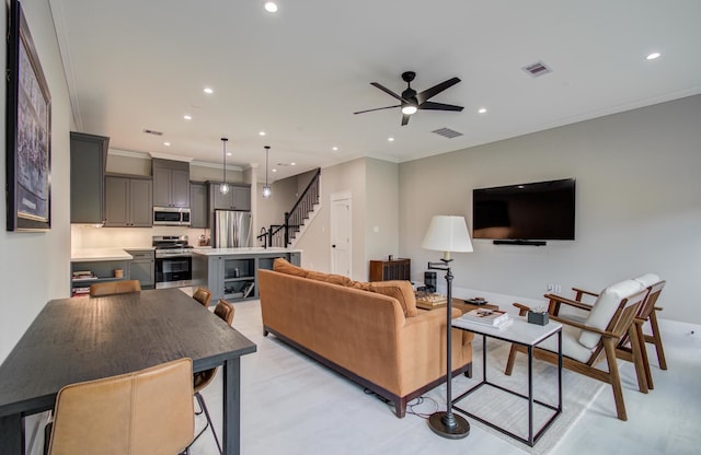 1708 Capron St Unit A, Houston, TX 77020 - living room featuring recessed lighting, ceiling fan, stairway, and crown molding