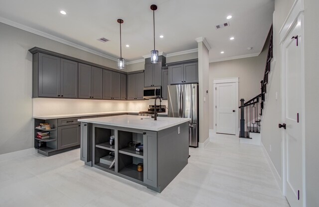 1708 Capron St Unit A, Houston, TX 77020 - kitchen featuring open shelves, appliances with stainless steel finishes, gray cabinetry, crown molding, and a center island with sink