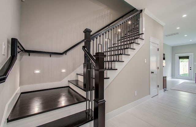 1708 Capron St Unit A, Houston, TX 77020 - stairs featuring recessed lighting, baseboards, crown molding, and wood finished floors