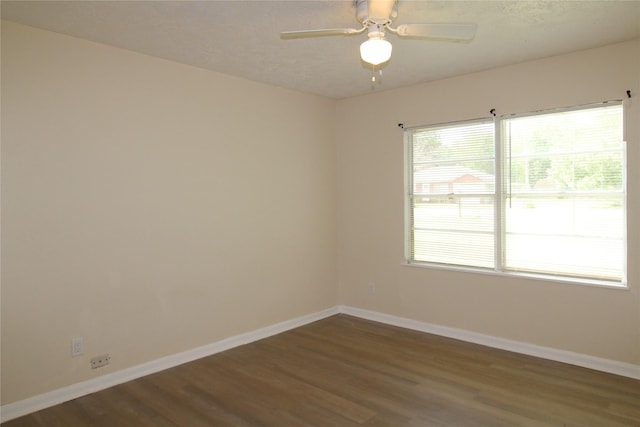 916 Cedar Bayou Rd, Baytown, TX 77520 - unfurnished room featuring dark wood-type flooring and baseboards