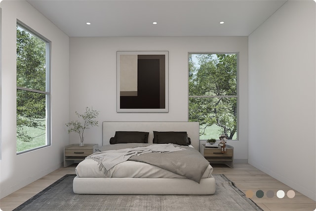 1407 Indiana St, Houston, TX 77006 - bedroom with light wood-type flooring, multiple windows, and recessed lighting