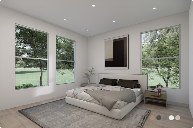 1407 Indiana St, Houston, TX 77006 - bedroom featuring multiple windows, recessed lighting, and light wood-style floors