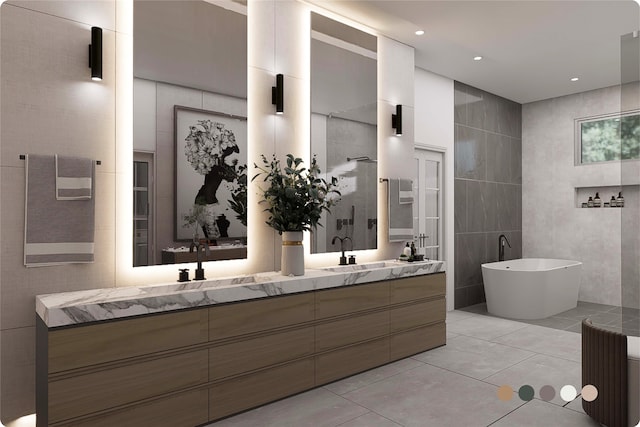 1407 Indiana St, Houston, TX 77006 - bathroom featuring double vanity, tile walls, a freestanding bath, and tile patterned floors