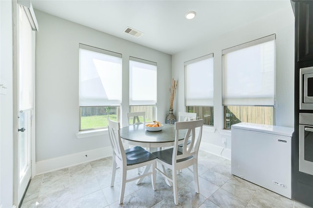1103 River Delta Ln, Rosenberg, TX 77469 - dining space with baseboards