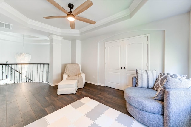 1103 River Delta Ln, Rosenberg, TX 77469 - sitting room with a raised ceiling, a ceiling fan, dark wood-style flooring, ornamental molding, and baseboards