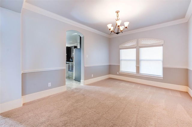 1103 River Delta Ln, Rosenberg, TX 77469 - carpeted empty room featuring arched walkways, a chandelier, crown molding, and baseboards