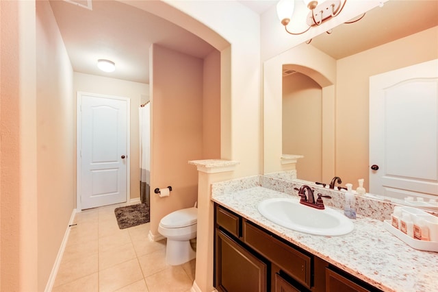 1103 River Delta Ln, Rosenberg, TX 77469 - bathroom featuring vanity, toilet, tile patterned floors, baseboards, and a shower with curtain