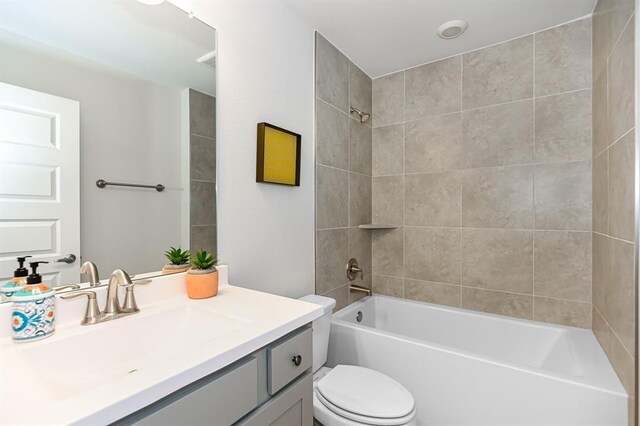 13620 Sorico Bay Dr, Texas City, TX 77568 - bathroom with vanity, toilet, and shower / bathtub combination